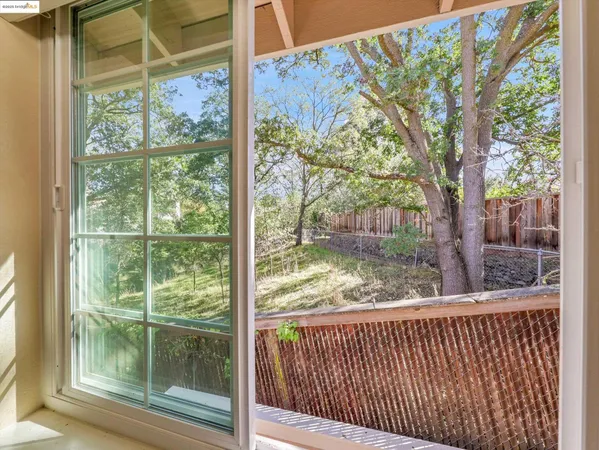 a view of a balcony with an outdoor space
