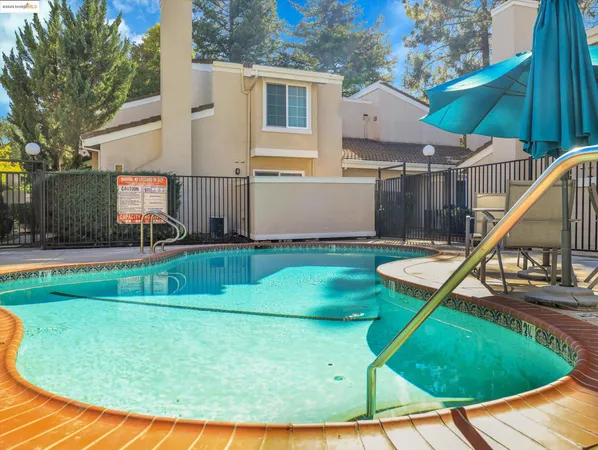 a view of a house with a swimming pool