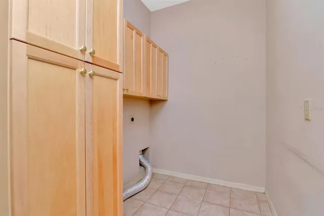 a spacious bathroom with a double vanity sink a mirror and a shower
