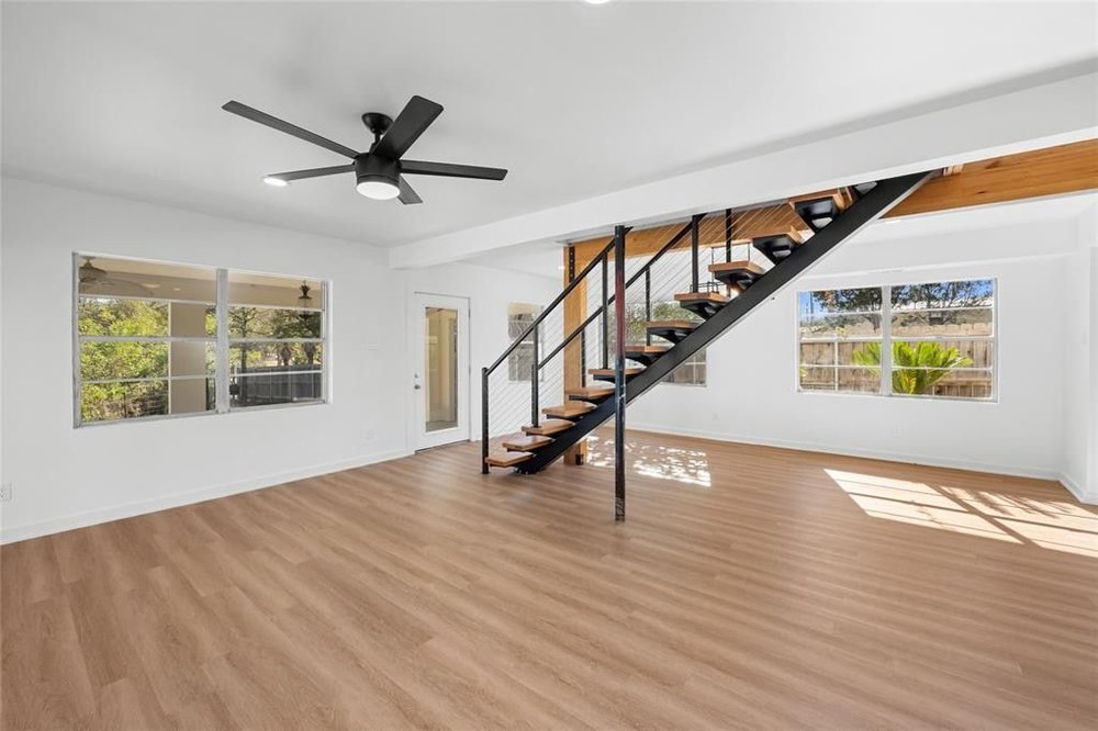 20204 Barnett Glenn Road Spicewood, TX 78669 - Photo 9 of 34 a view of an entryway with wooden floor