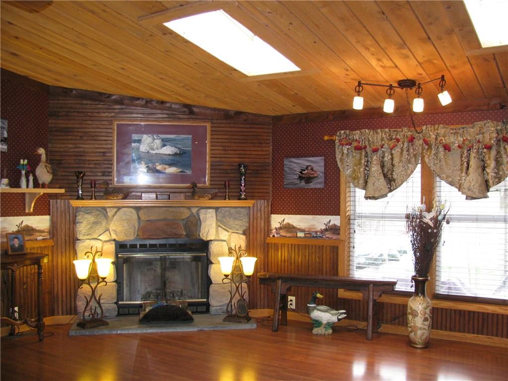 100 Leech Road Greenville, PA 16125 - Photo 15 of 23 WOOD CEILING, FIREPLACE AND SKYLIGHT IN GREAT ROOM