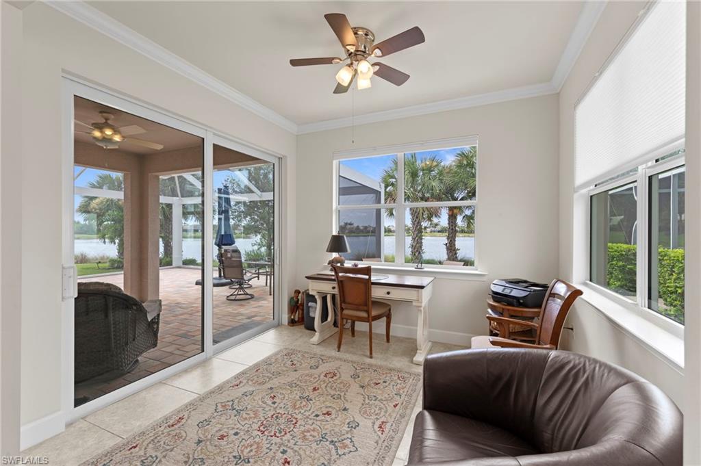 10507 Jackson Square Drive Estero, FL 33928 - Photo 20 of 46 a living room with furniture and a large window