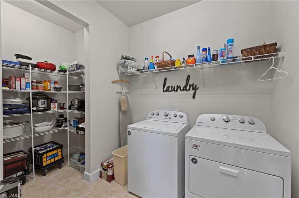 10507 Jackson Square Drive Estero, FL 33928 - Photo 28 of 46 a utility room with dryer and washer