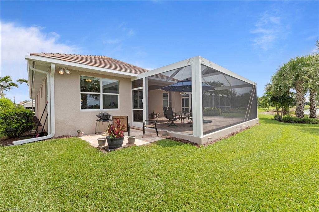 10507 Jackson Square Drive Estero, FL 33928 - Photo 36 of 46 a view of a house with backyard porch and sitting area