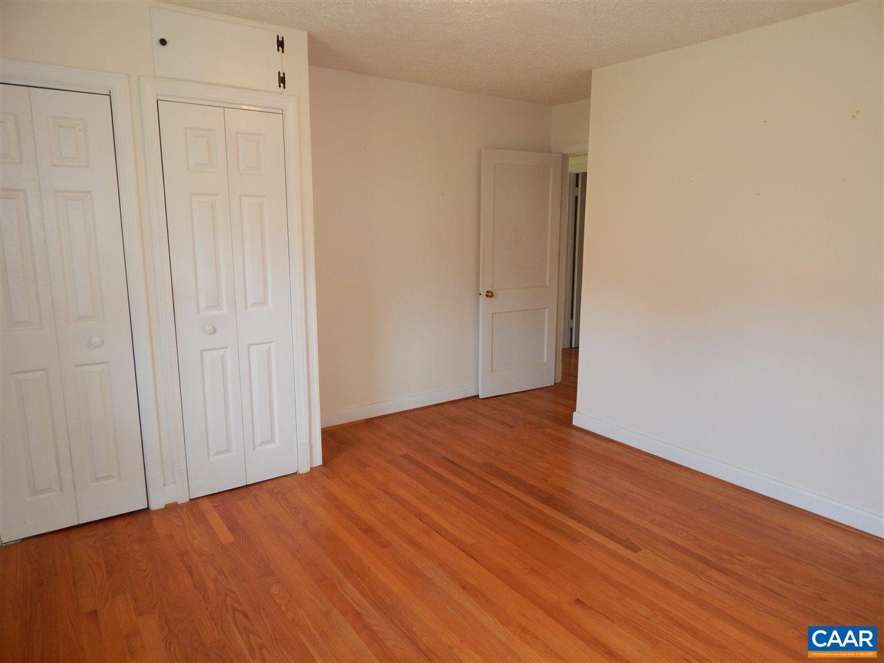 4805 3 Notch Road Louisa, VA 23093 - Photo 11 of 22 a view of an empty room with wooden floor