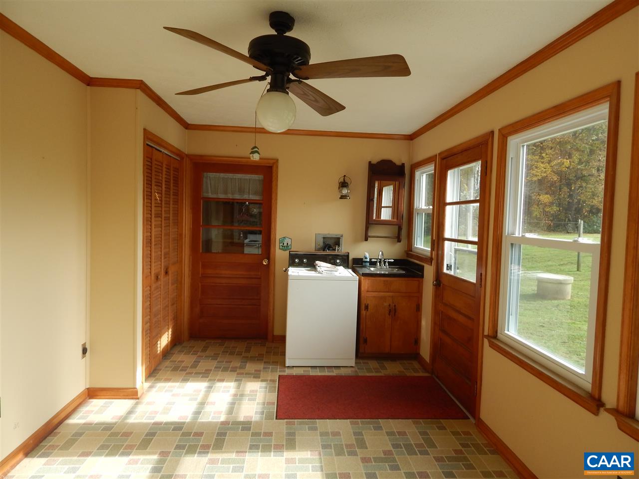 4805 3 Notch Road Louisa, VA 23093 - Photo 5 of 22 a kitchen with a refrigerator and a stove
