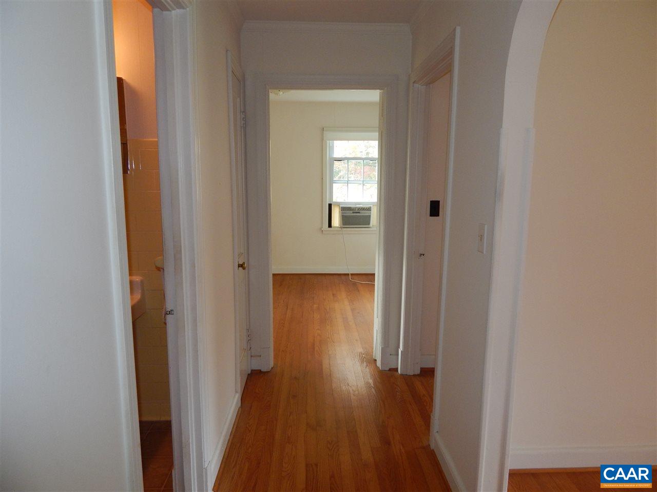 4805 3 Notch Road Louisa, VA 23093 - Photo 8 of 22 a view of a hallway with wooden floor