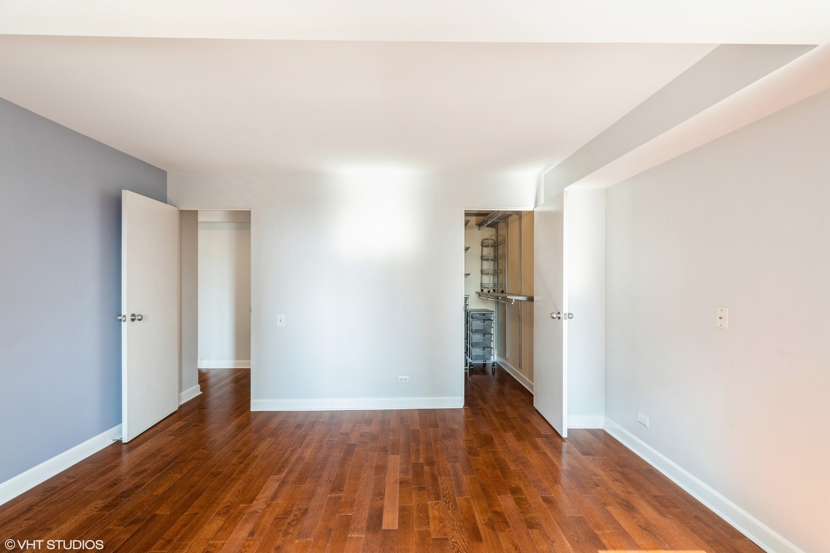 40 East 9th Street, Unit 1605 Chicago, IL 60605 - Photo 10 of 21 a view of an empty room with wooden floor