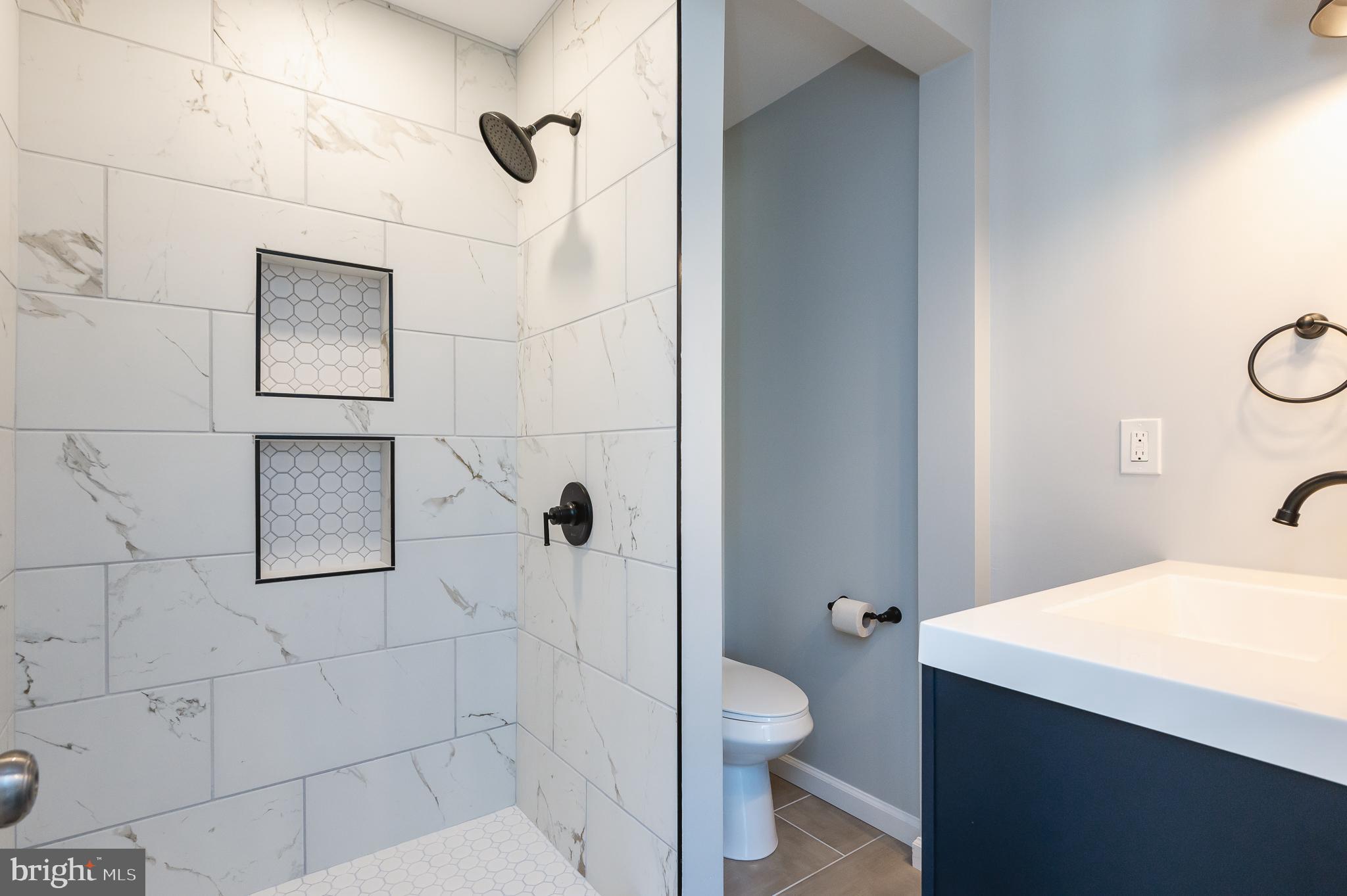 28 Riverside Road Essex, MD 21221 - Photo 30 of 58 Stunning Shower w/Beautiful Tile Work