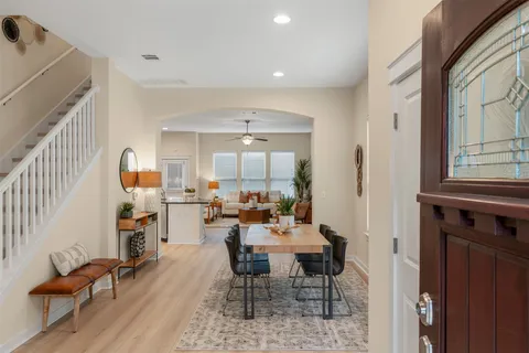 a view of a dining room with furniture window and outside view