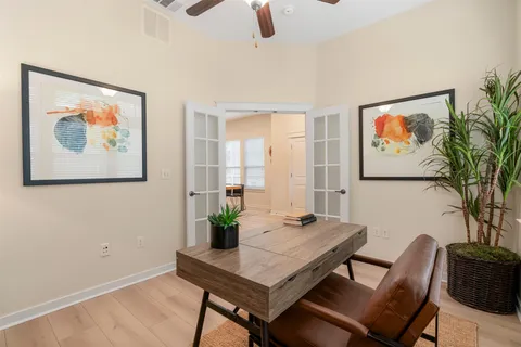 a view of a livingroom with furniture and window