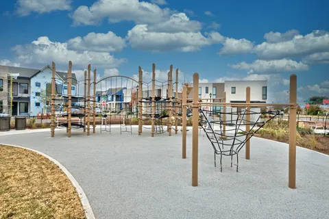 a view of a swimming pool with outdoor seating
