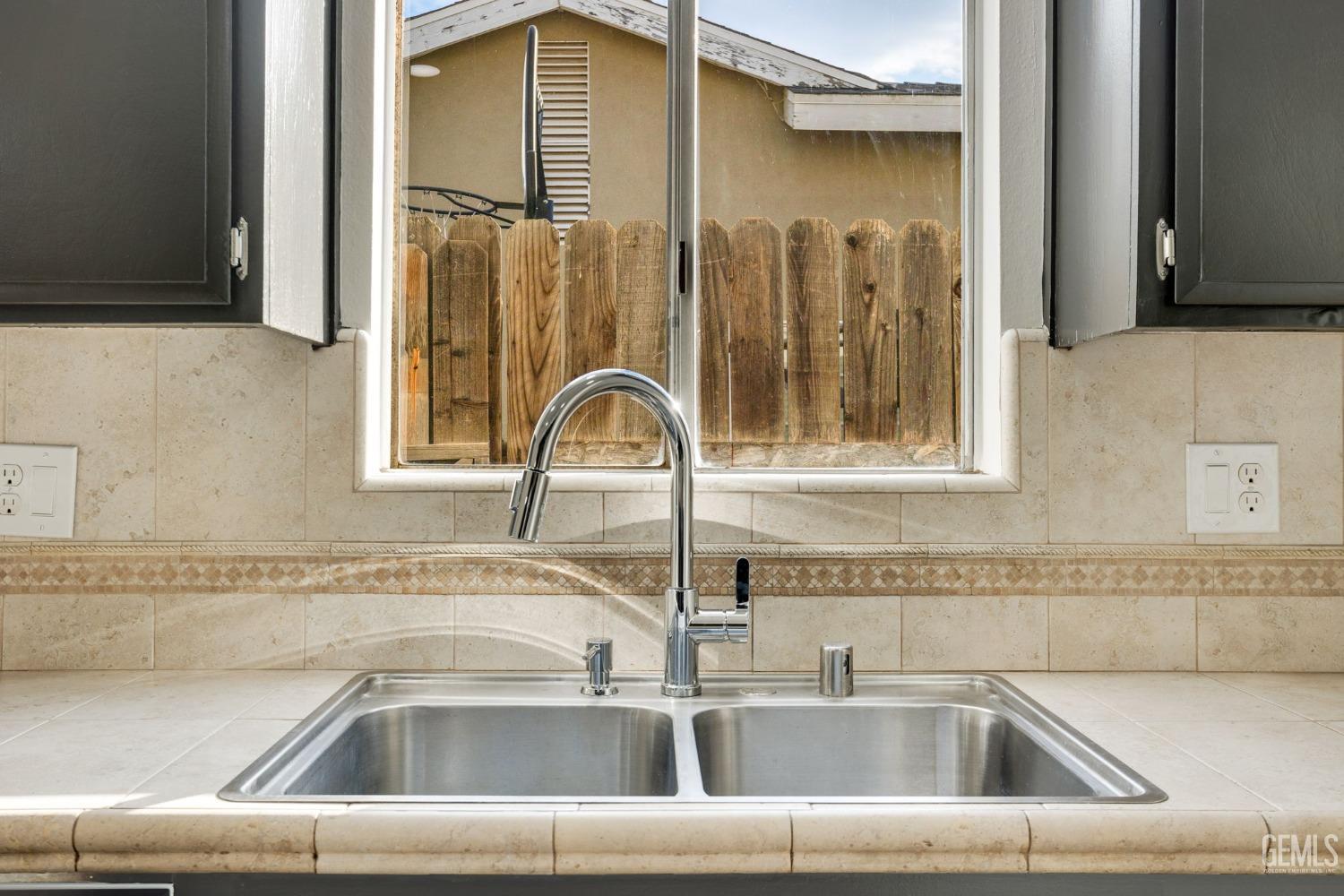 Undisclosed Address Bakersfield, CA 93304 - Photo 11 of 31 a close view of a sink and a bathroom sink