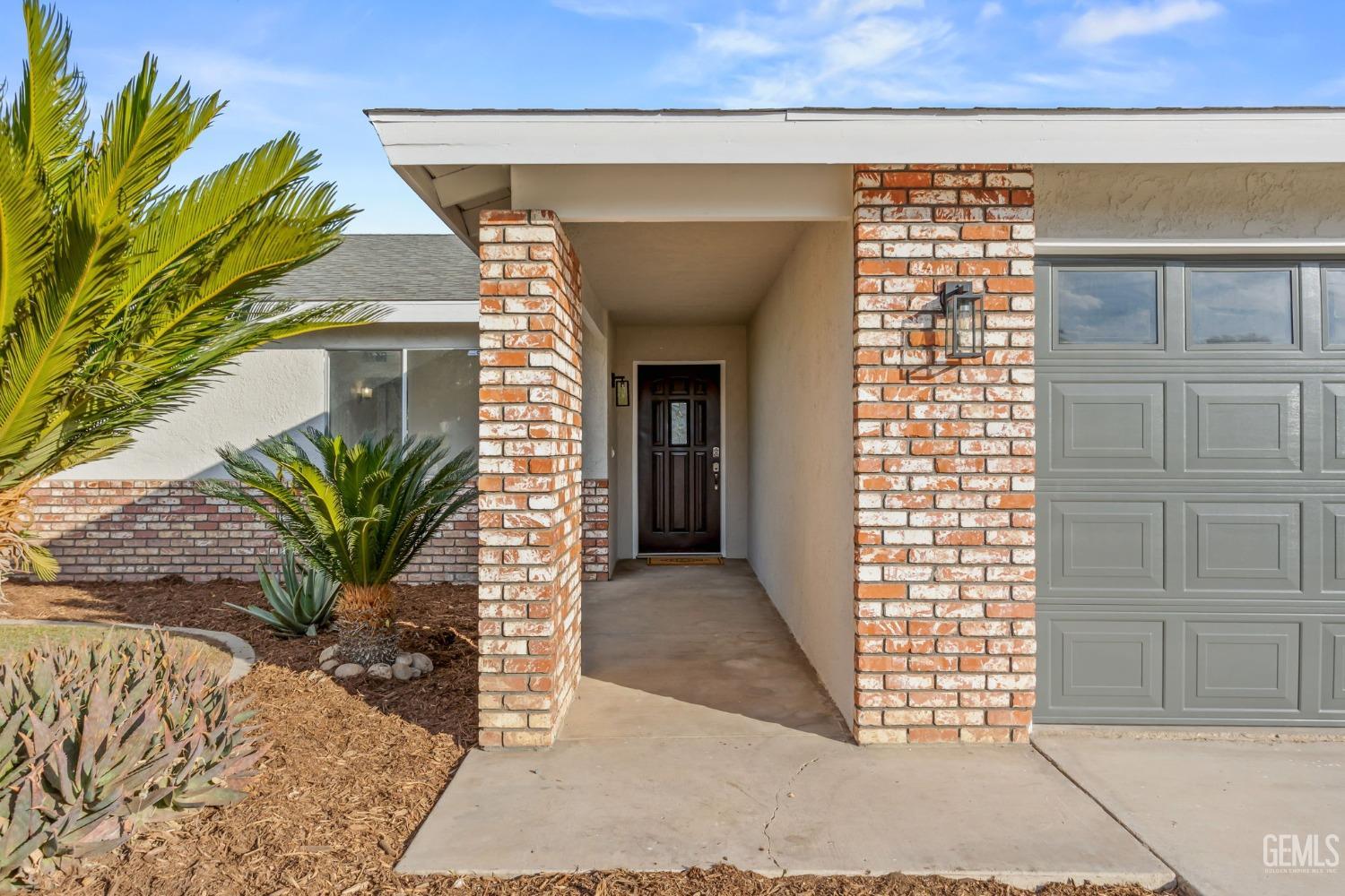Undisclosed Address Bakersfield, CA 93304 - Photo 2 of 31 a view of entryway with a door