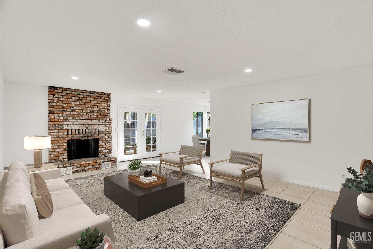 Undisclosed Address Bakersfield, CA 93304 - Photo 4 of 31 a living room with furniture and a fireplace