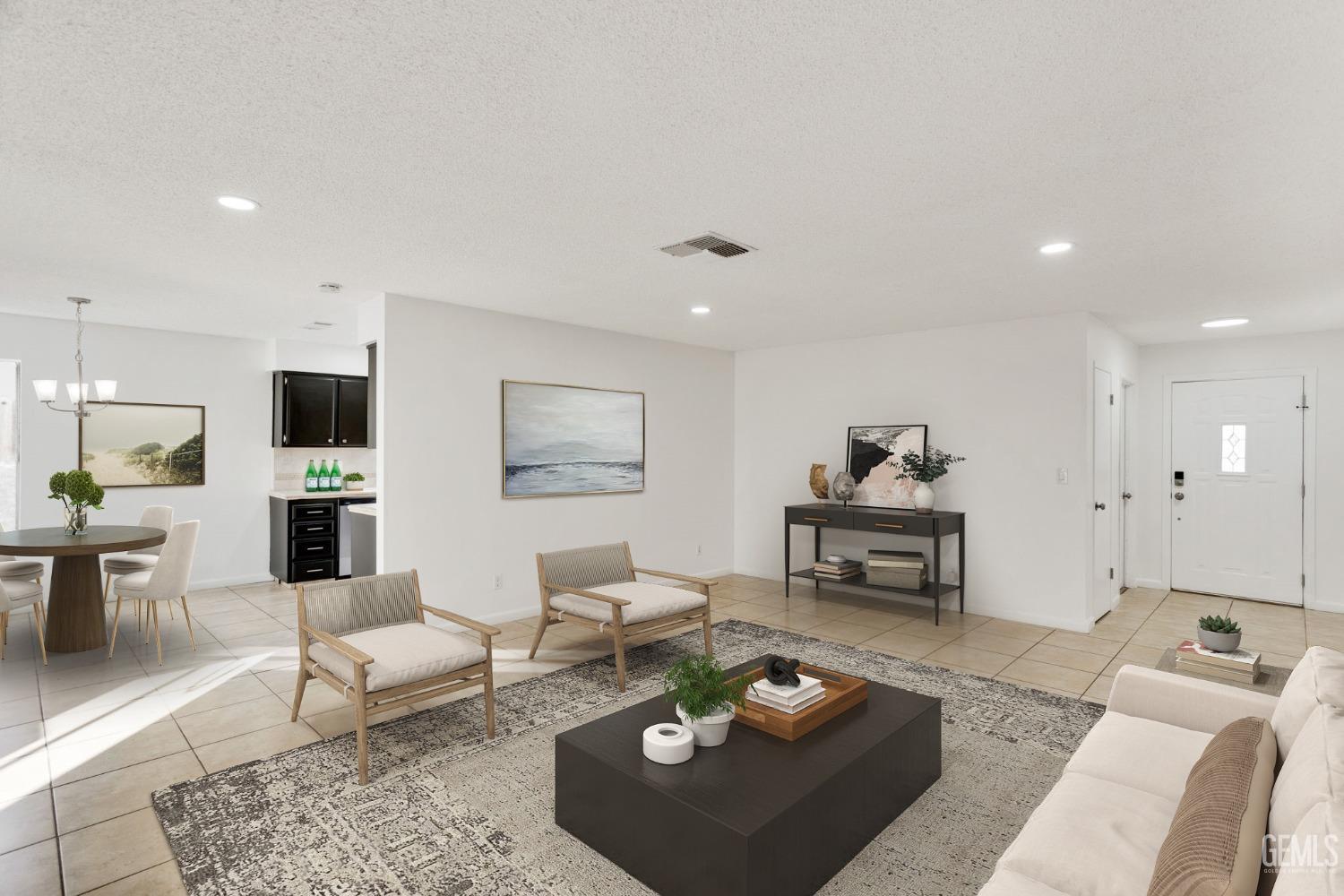 Undisclosed Address Bakersfield, CA 93304 - Photo 6 of 31 a living room with furniture and a wooden floor