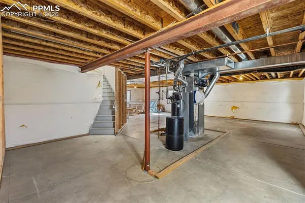 an aerial view of a house with a ocean view