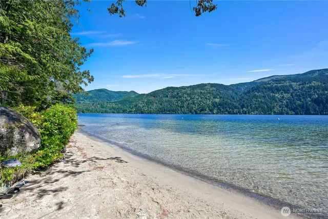 a aerial view of a house with swimming pool and garden