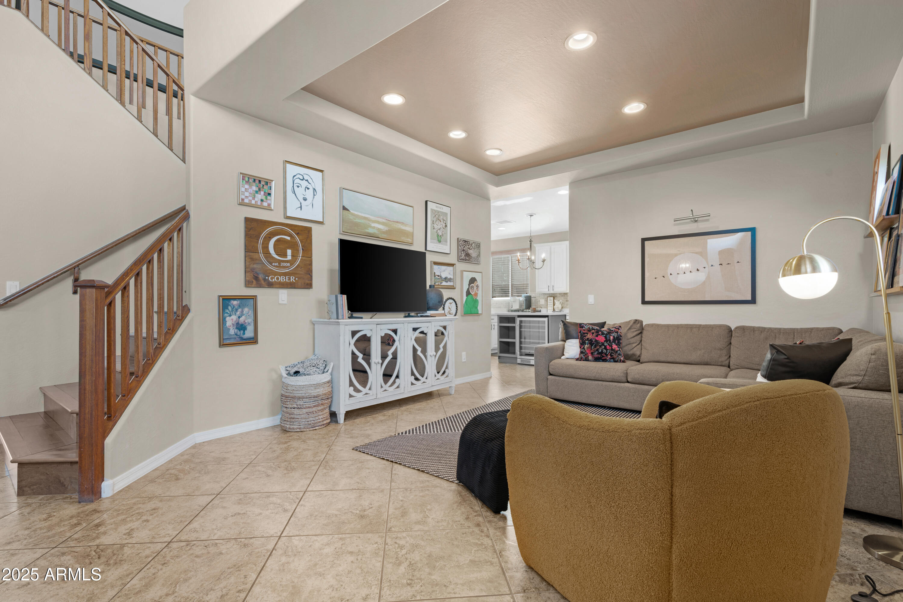 5419 West Tether Trail Phoenix, AZ 85083 - Photo 8 of 58 a living room with furniture and a flat screen tv