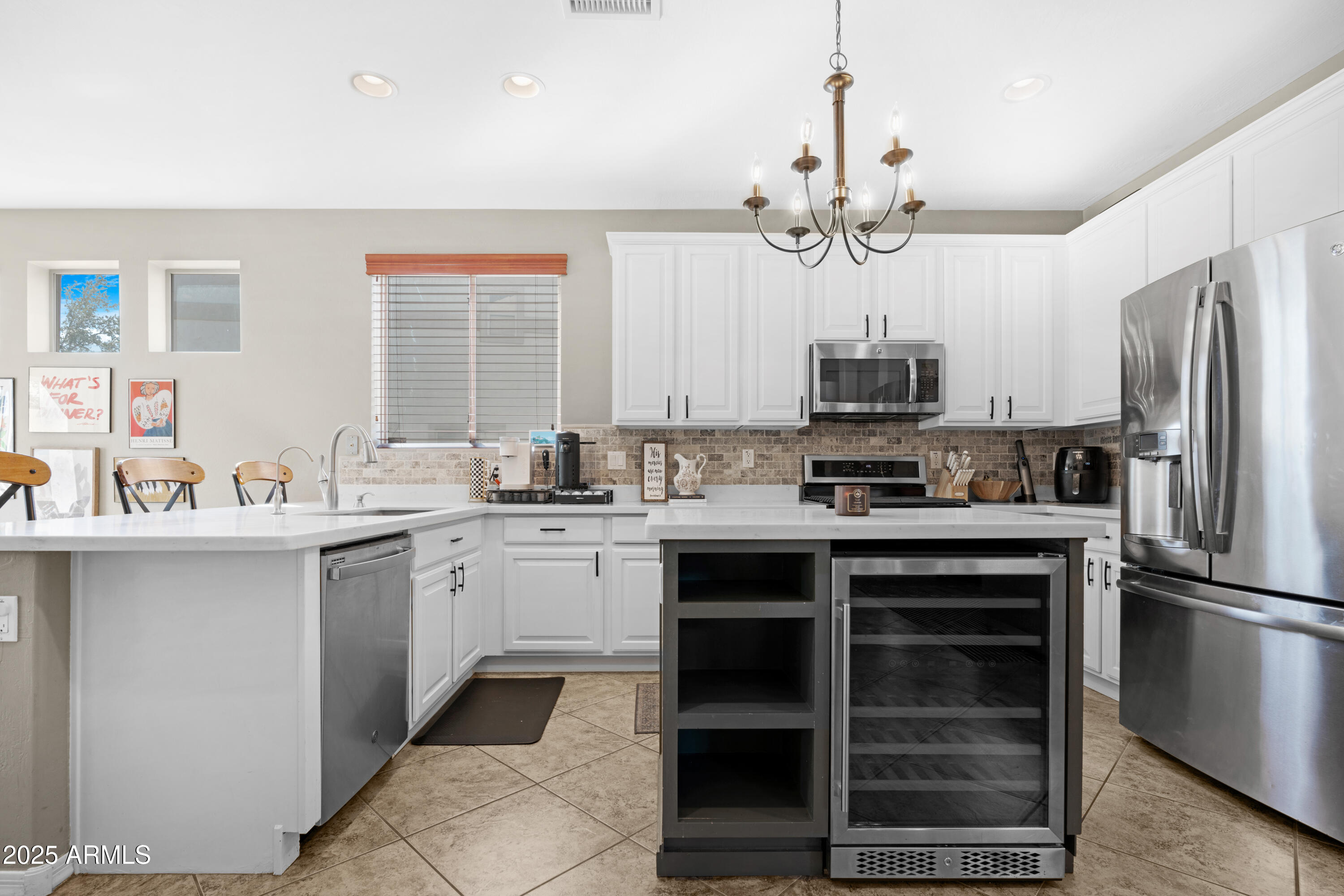 5419 West Tether Trail Phoenix, AZ 85083 - Photo 13 of 58 a kitchen with a sink stove and refrigerator