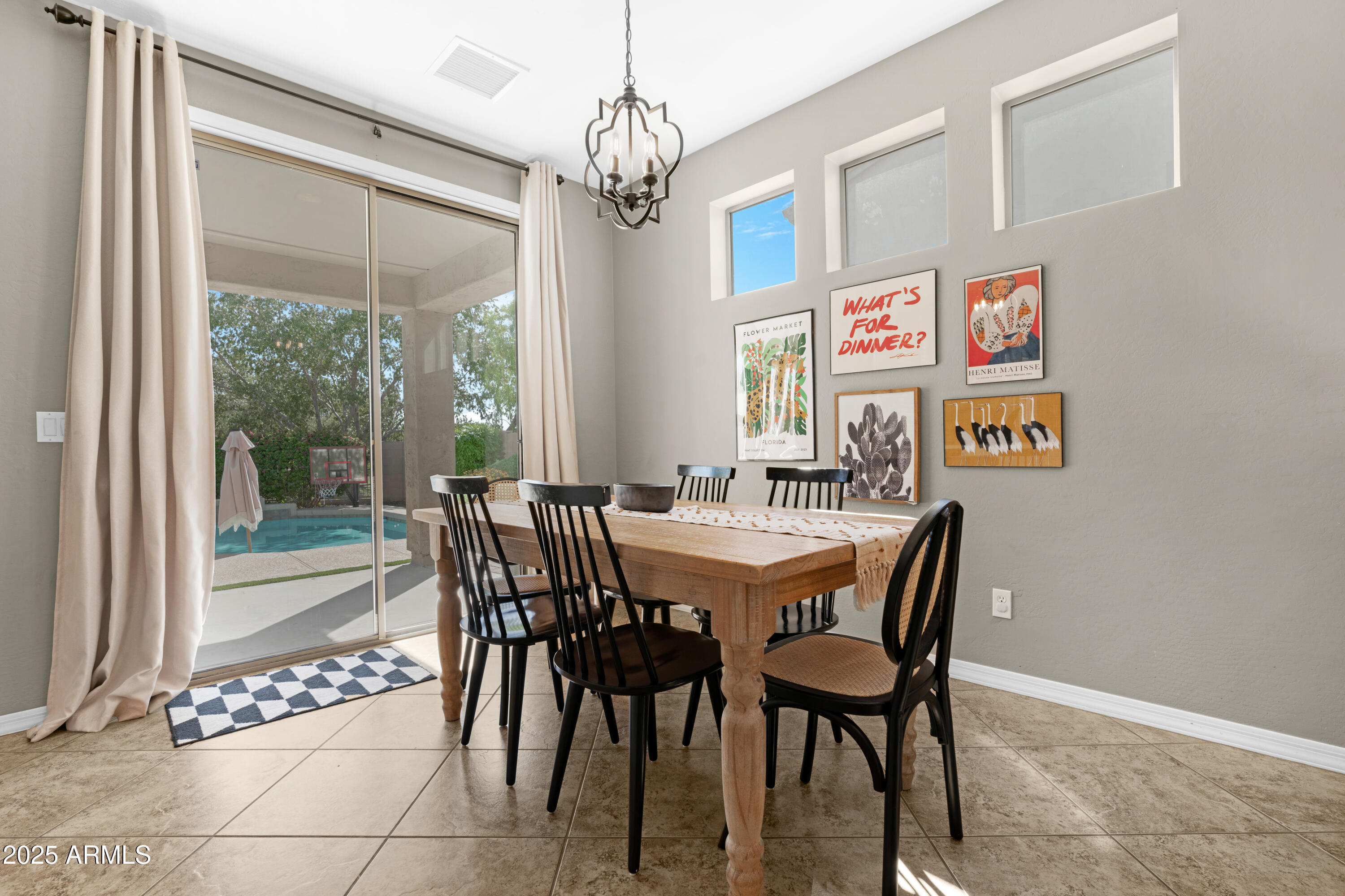 5419 West Tether Trail Phoenix, AZ 85083 - Photo 18 of 58 a view of a dining room with furniture window and outside view