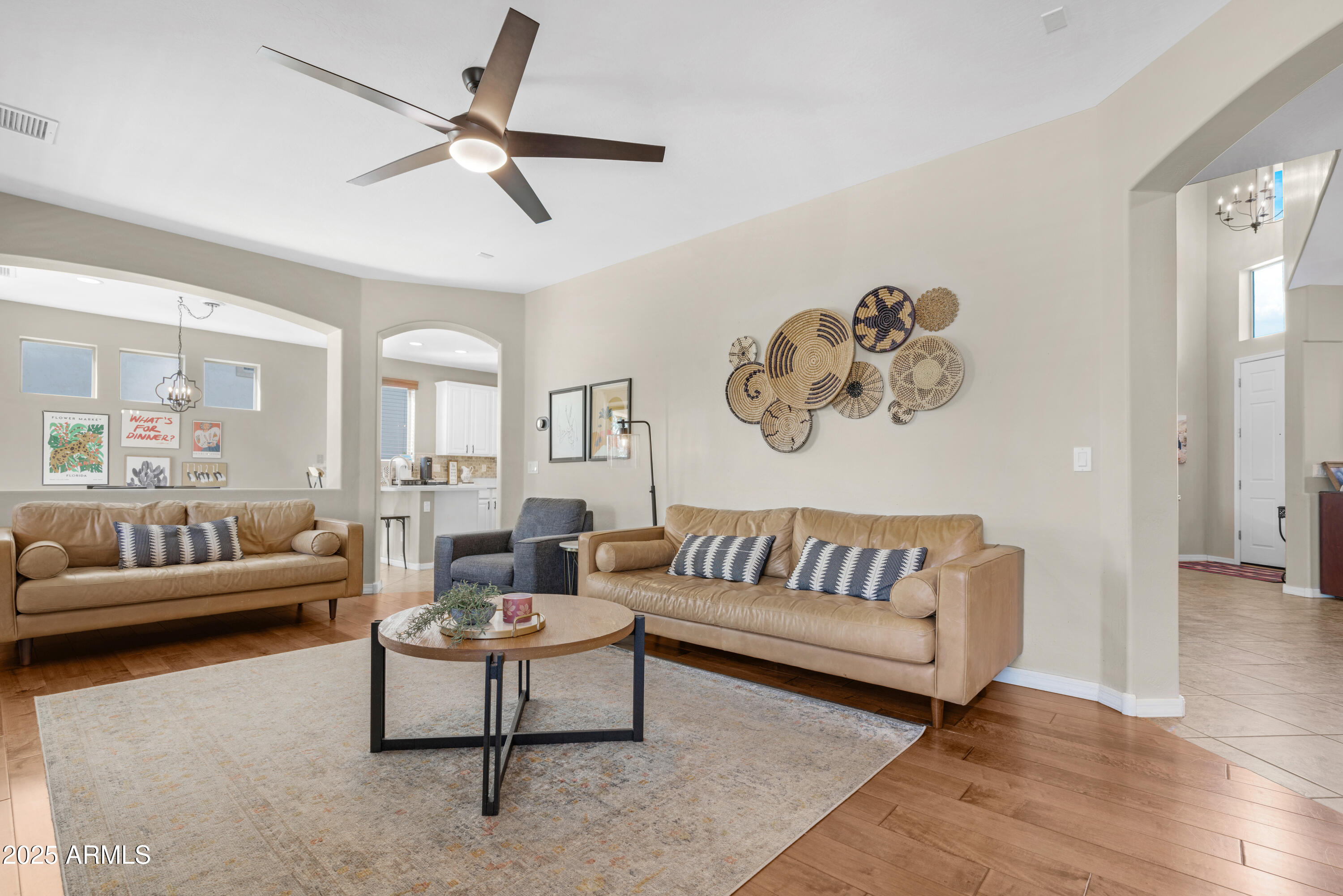 5419 West Tether Trail Phoenix, AZ 85083 - Photo 22 of 58 a living room with furniture and a large window