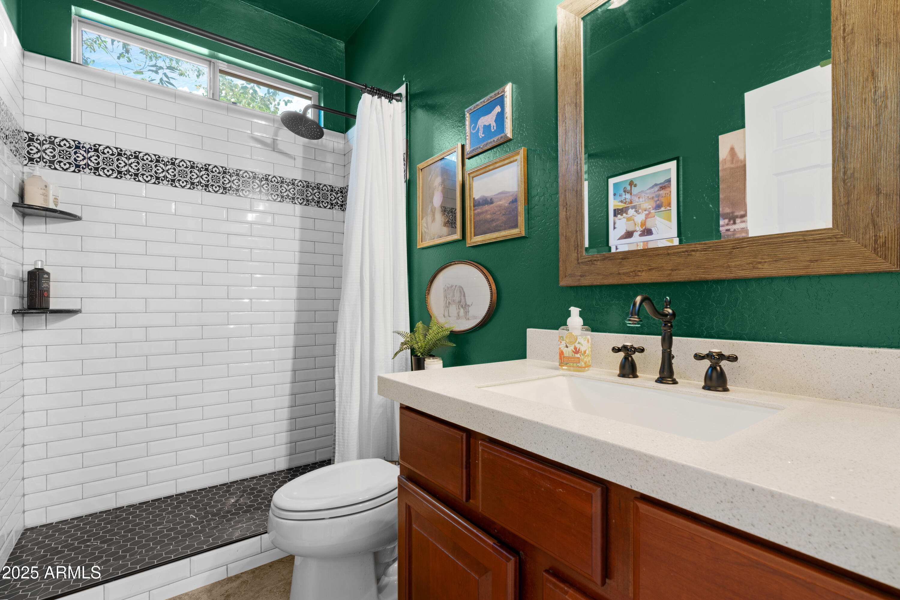 5419 West Tether Trail Phoenix, AZ 85083 - Photo 27 of 58 a bathroom with a sink mirror vanity and toilet