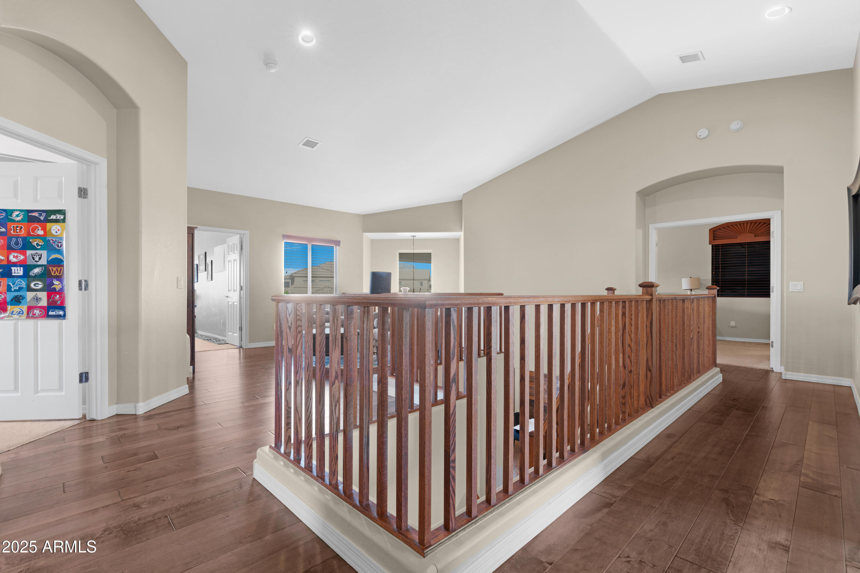 5419 West Tether Trail Phoenix, AZ 85083 - Photo 29 of 58 a view of a hallway with wooden floor and windows
