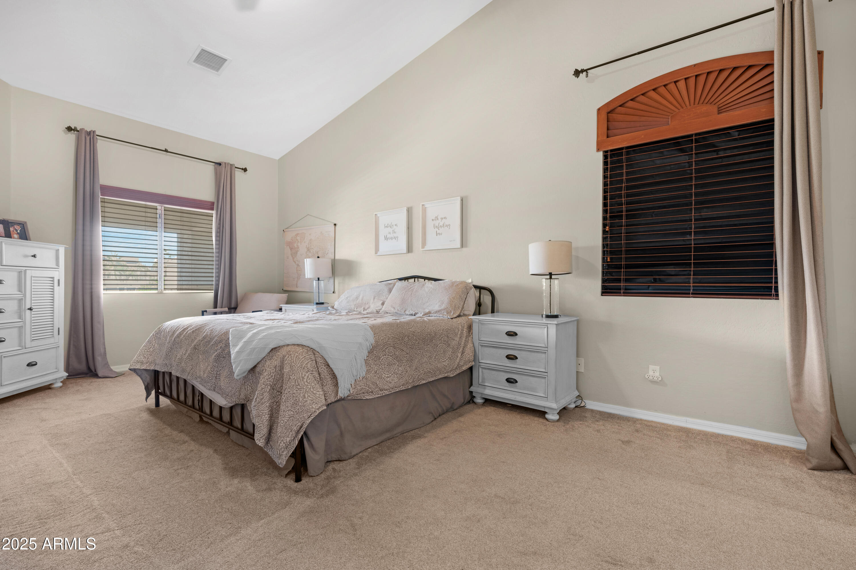 5419 West Tether Trail Phoenix, AZ 85083 - Photo 32 of 58 a spacious bedroom with a bed and a window