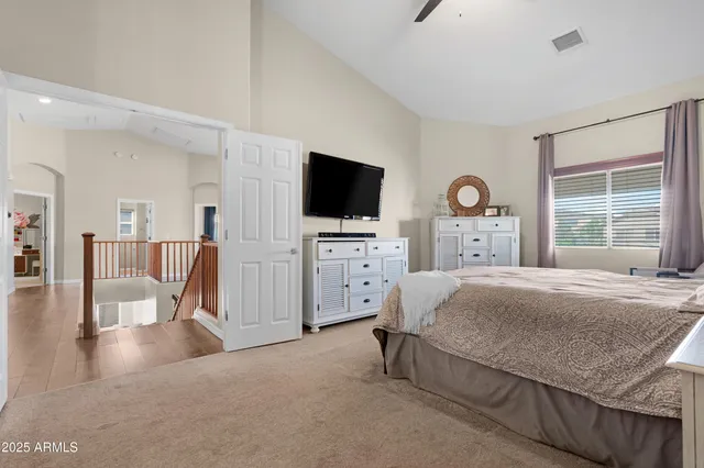 a bathroom with a granite countertop sink a mirror a shower and a bathtub