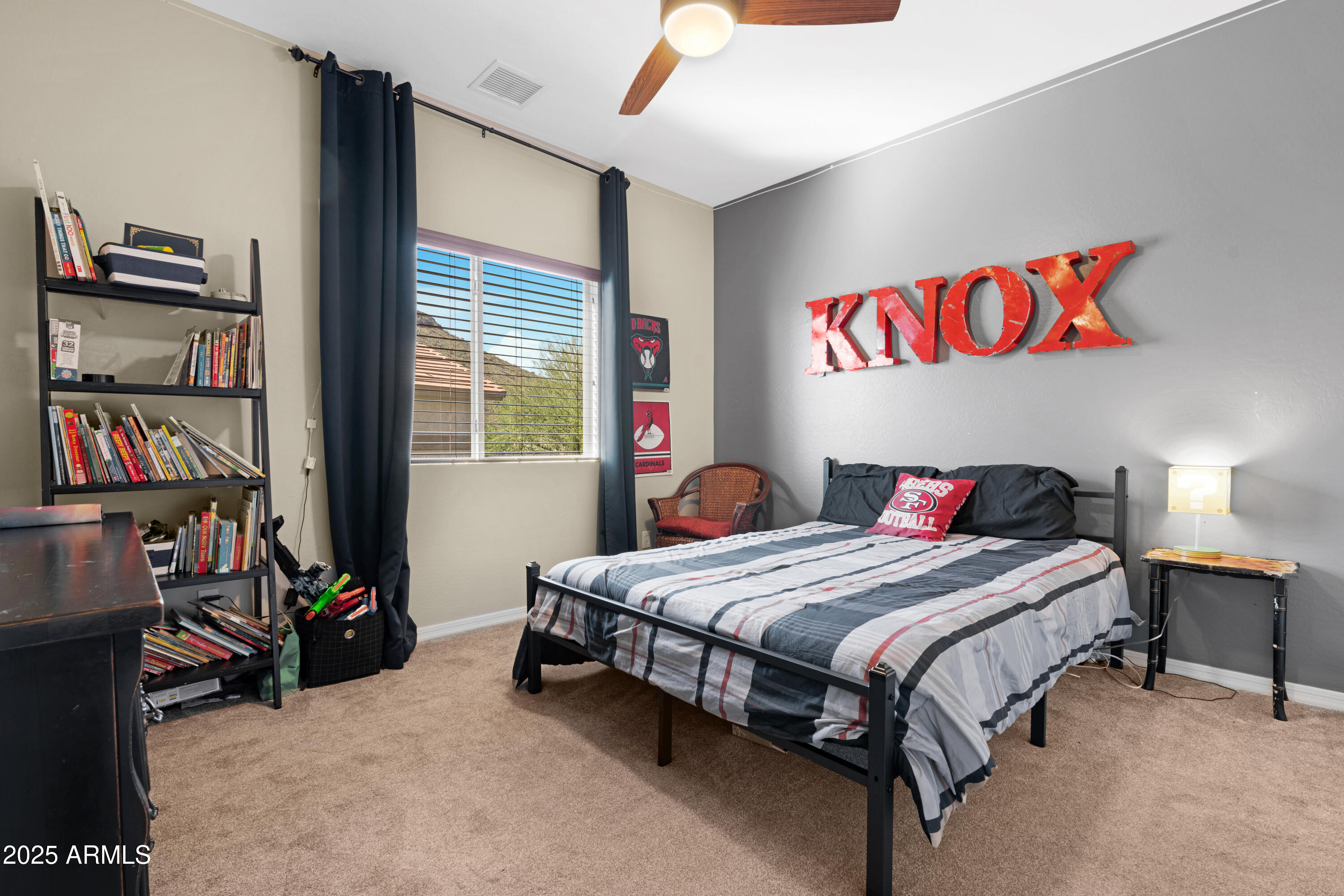 5419 West Tether Trail Phoenix, AZ 85083 - Photo 44 of 58 a bedroom with a bed and a closet