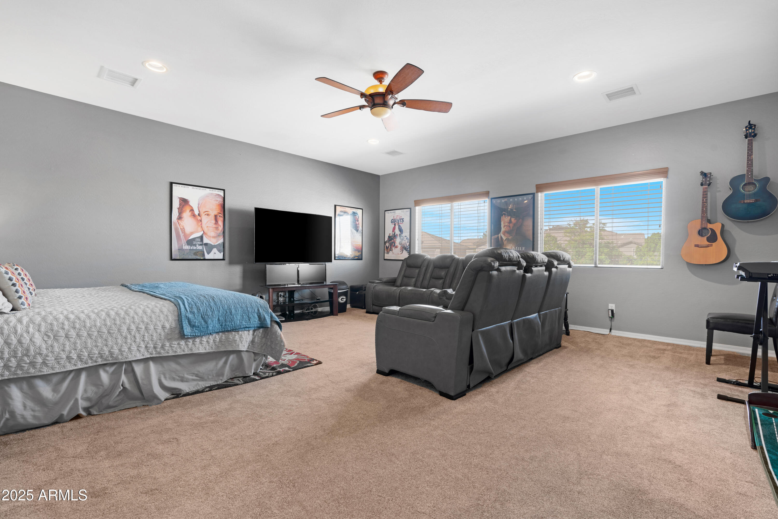 5419 West Tether Trail Phoenix, AZ 85083 - Photo 46 of 58 a living room with furniture flat screen tv and a window