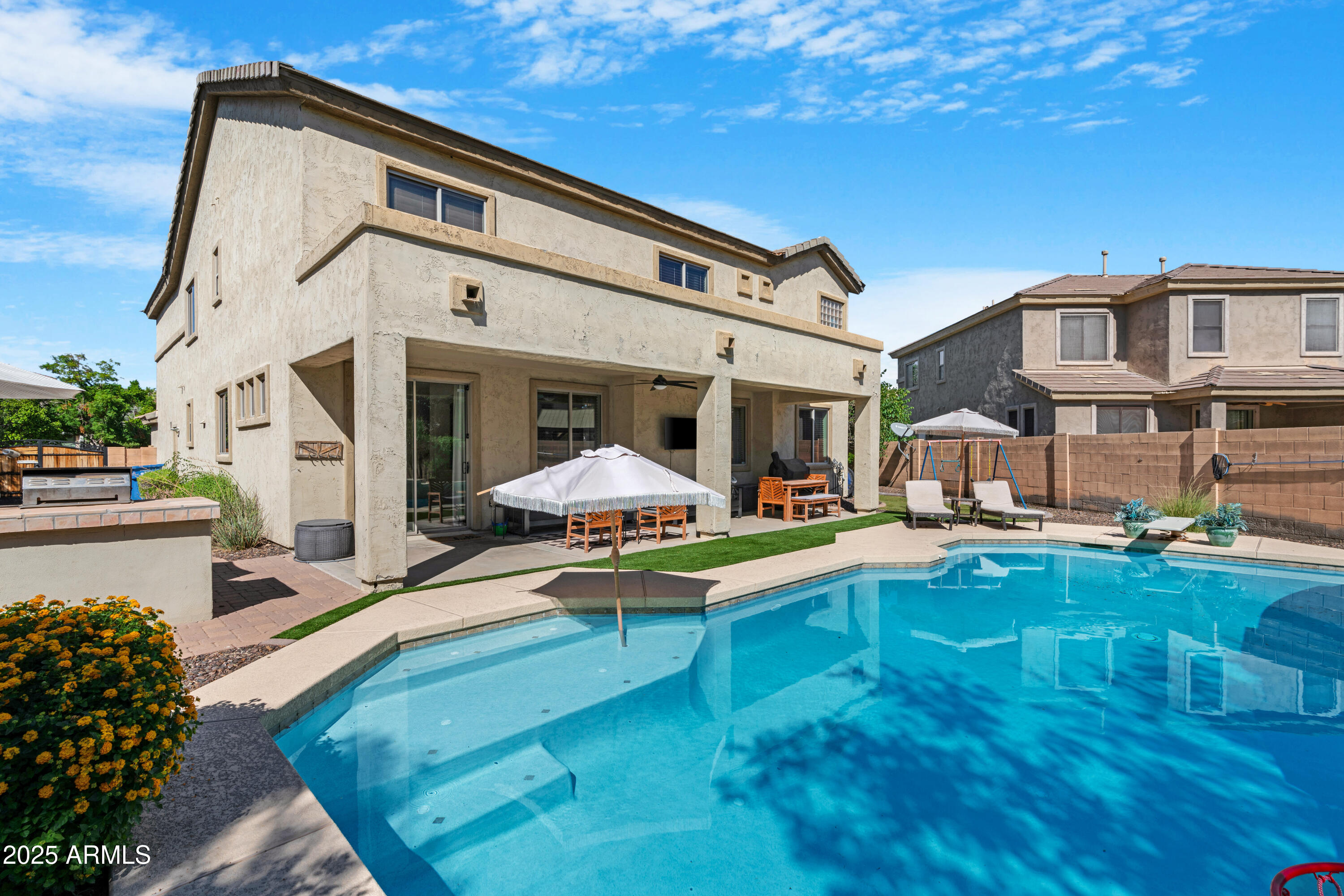 5419 West Tether Trail Phoenix, AZ 85083 - Photo 49 of 58 a view of a house with pool and sitting area