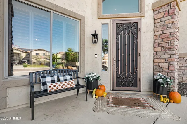 a view of a patio in the backyard