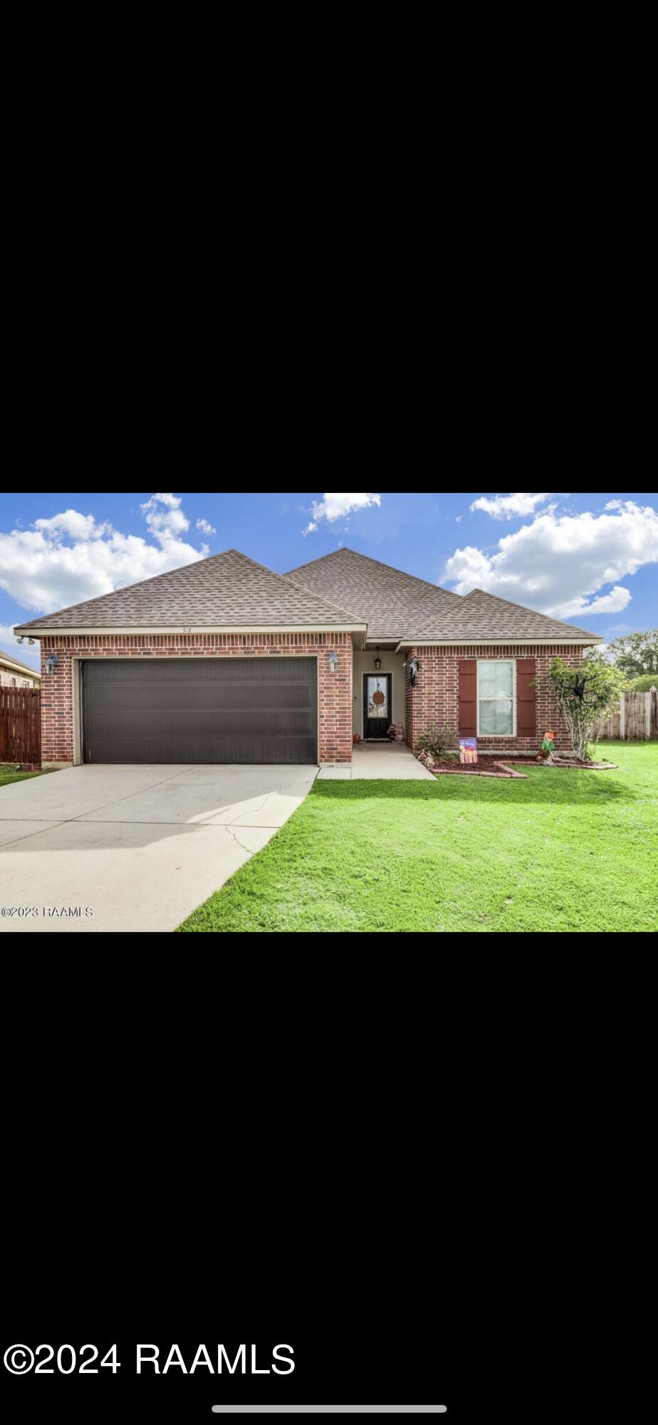 516 Flanders Ridge Drive Youngsville, LA 70592 - Photo 1 of 16 FED26D3C-30A8-4853-AB36-10B15965EA05