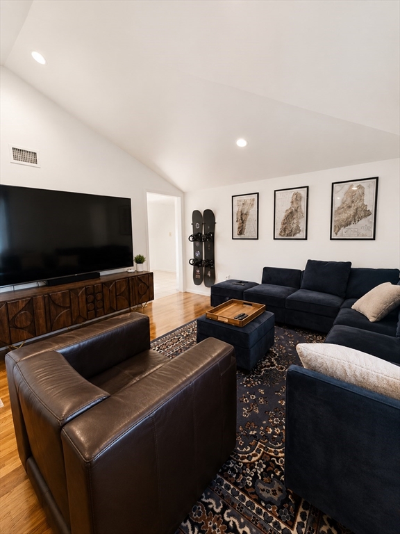 5 Myrtle Street, Unit 3 Saugus, MA 01906 - Photo 13 of 15 a living room with furniture and a flat screen tv