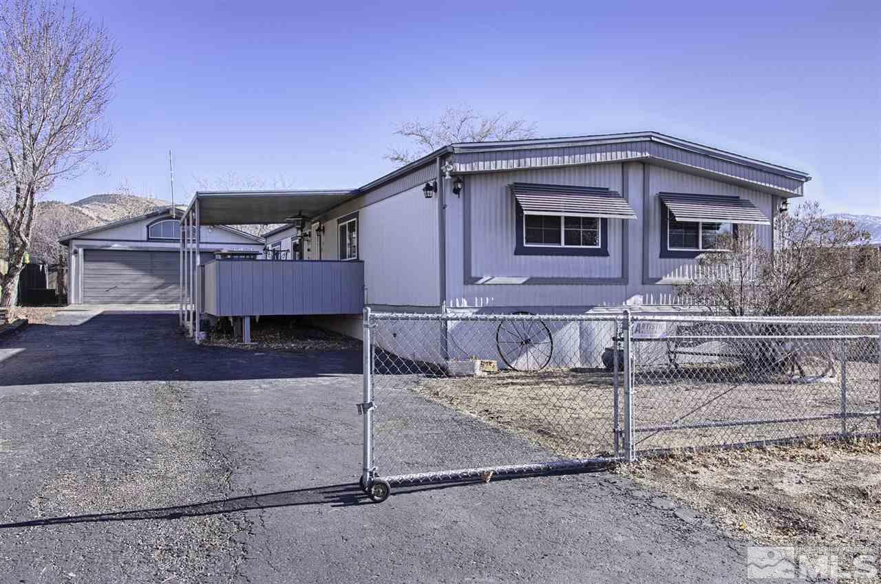 15085 Rhyolite Circle Reno, NV 89521 - Photo 1 of 23 a view of a house with a backyard