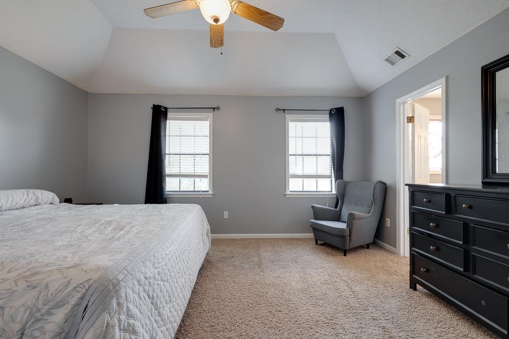 6943 Doefield Trail Bartlett, TN 38135 - Photo 19 of 32 a bedroom with a bed and furniture