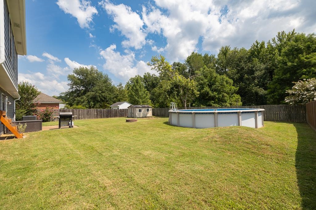 6943 Doefield Trail Bartlett, TN 38135 - Photo 31 of 32 a view of a house with yard and entertaining space