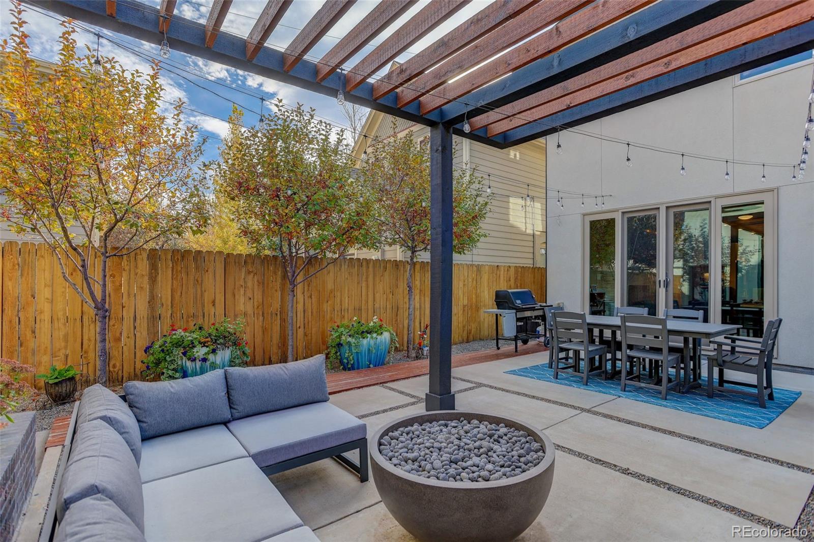 4132 Stuart Street Denver, CO 80212 - Photo 13 of 35 a outdoor living space with furniture and a potted plant