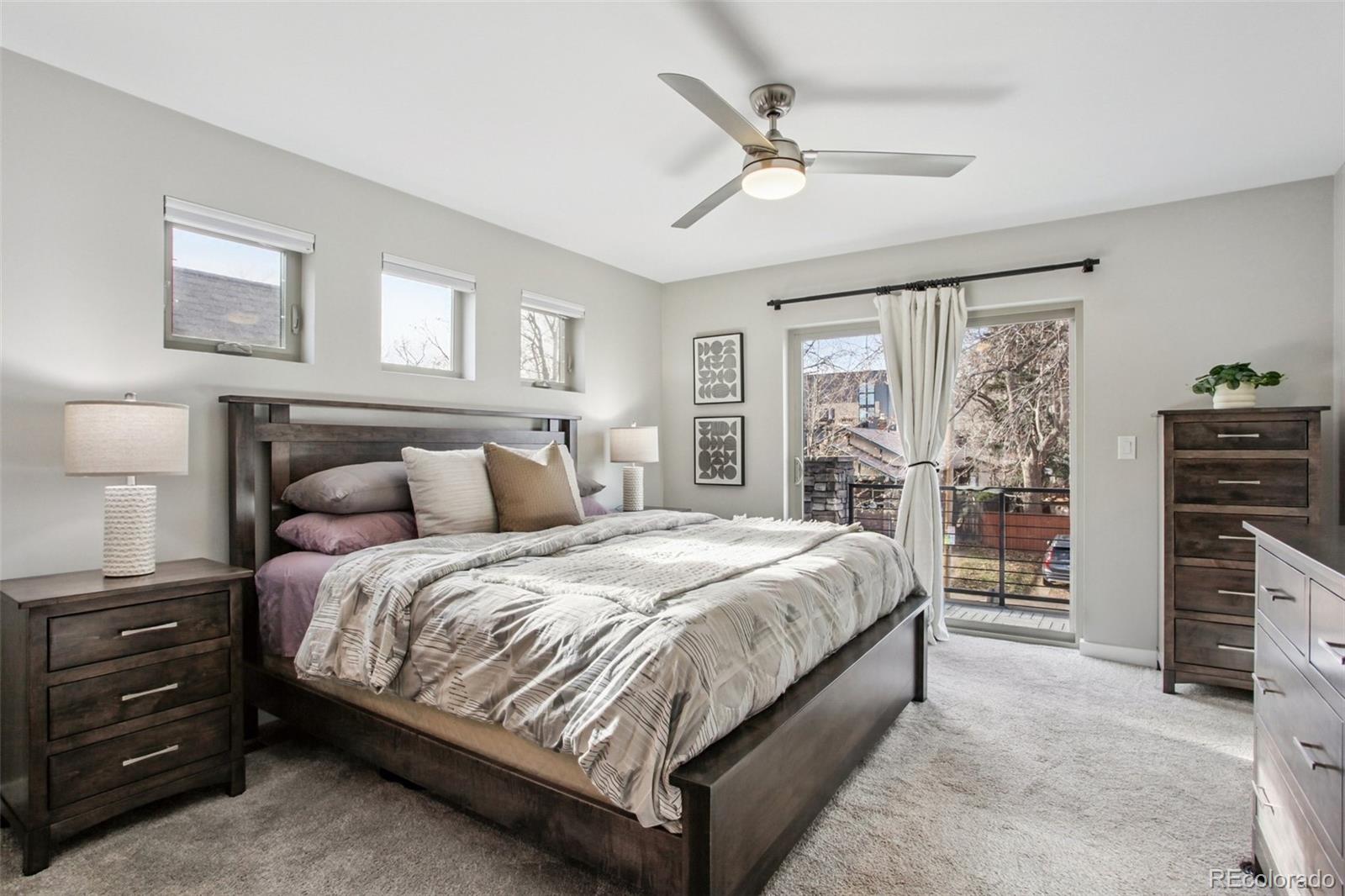 4132 Stuart Street Denver, CO 80212 - Photo 16 of 35 a bed room with a bed and a window