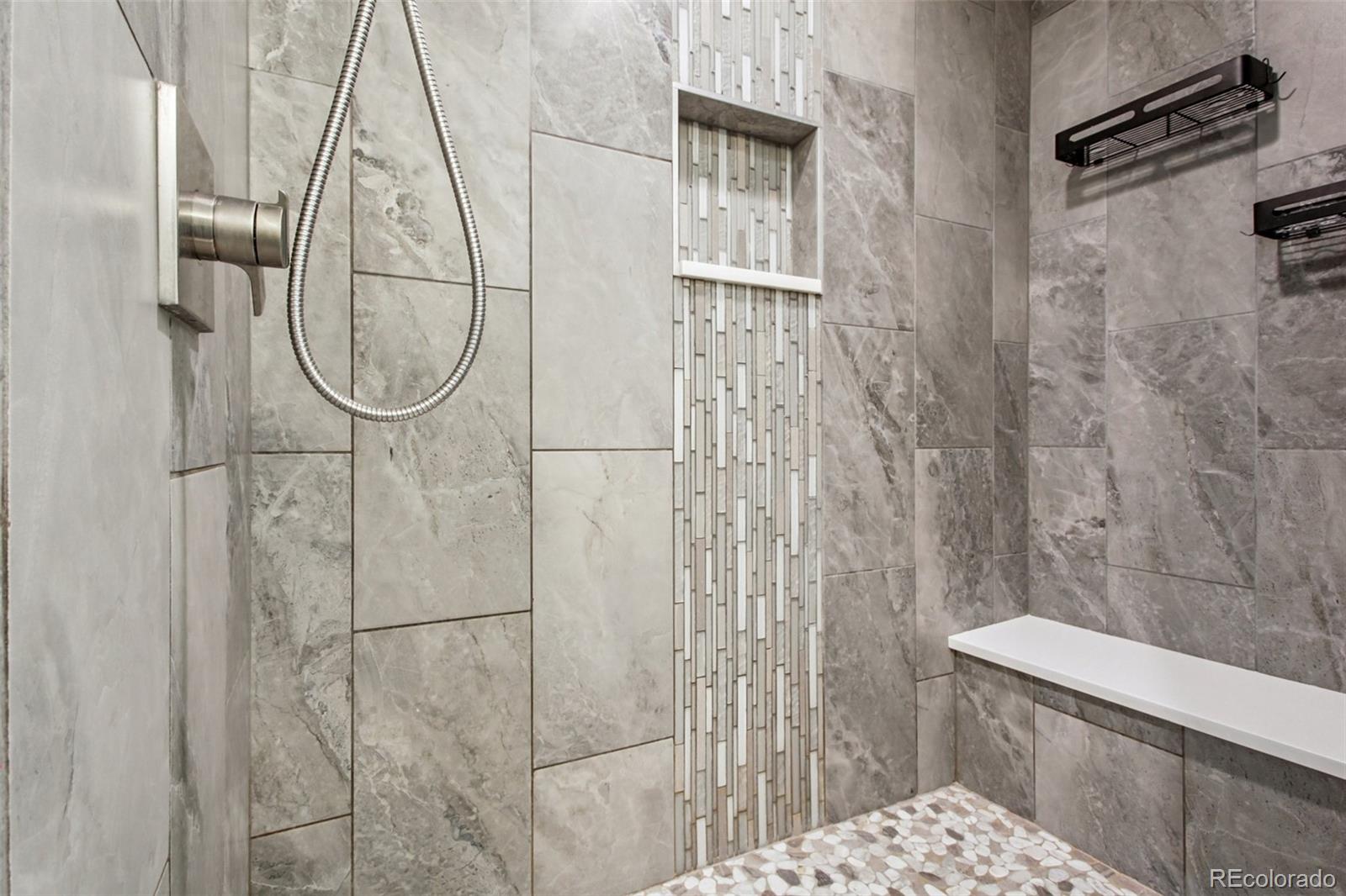 4132 Stuart Street Denver, CO 80212 - Photo 20 of 35 a bathroom with a shower