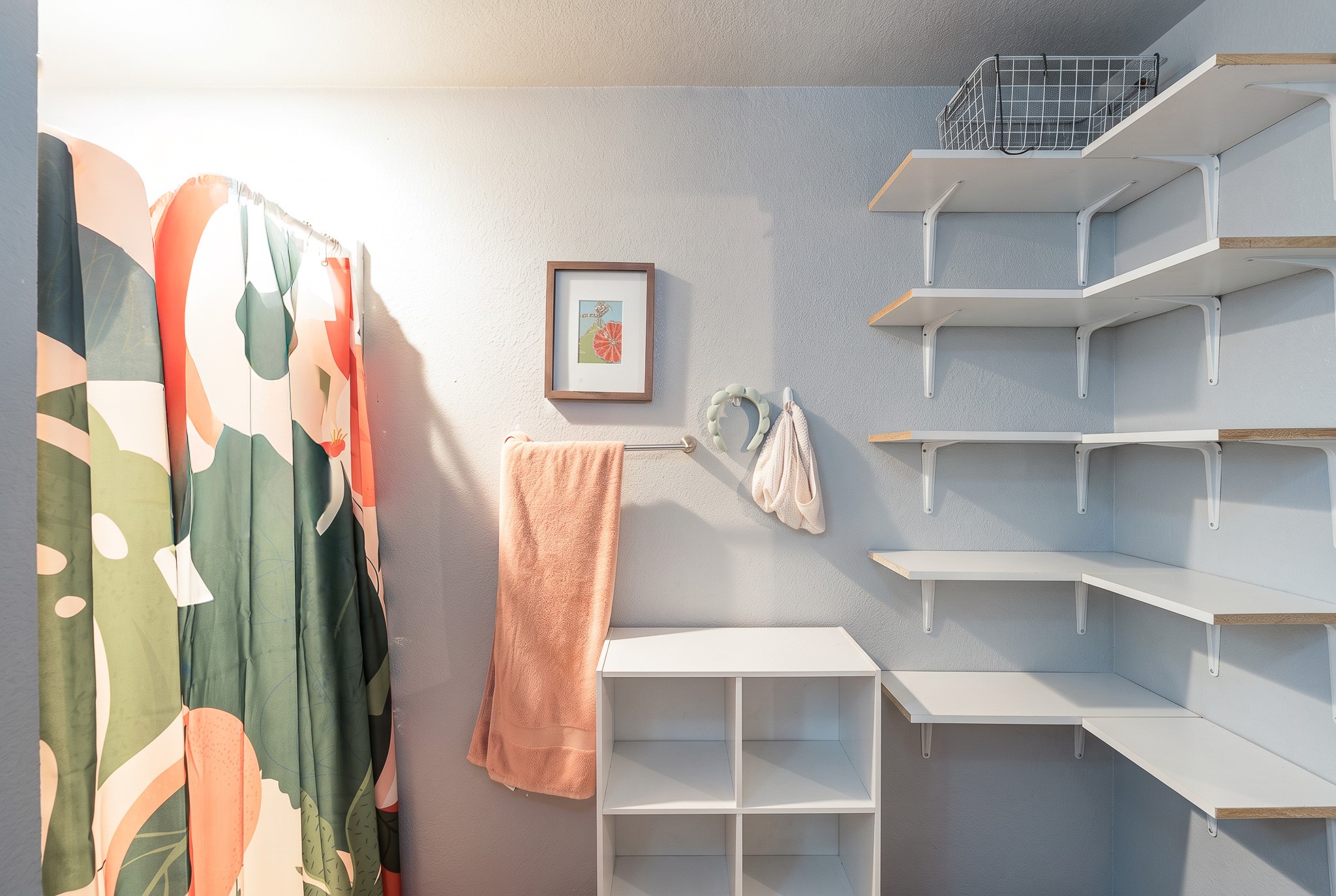 701 Vargas Road Austin, TX 78741 - Photo 12 of 13 Ample built-in shelving optimizes organization in this versatile closet space.