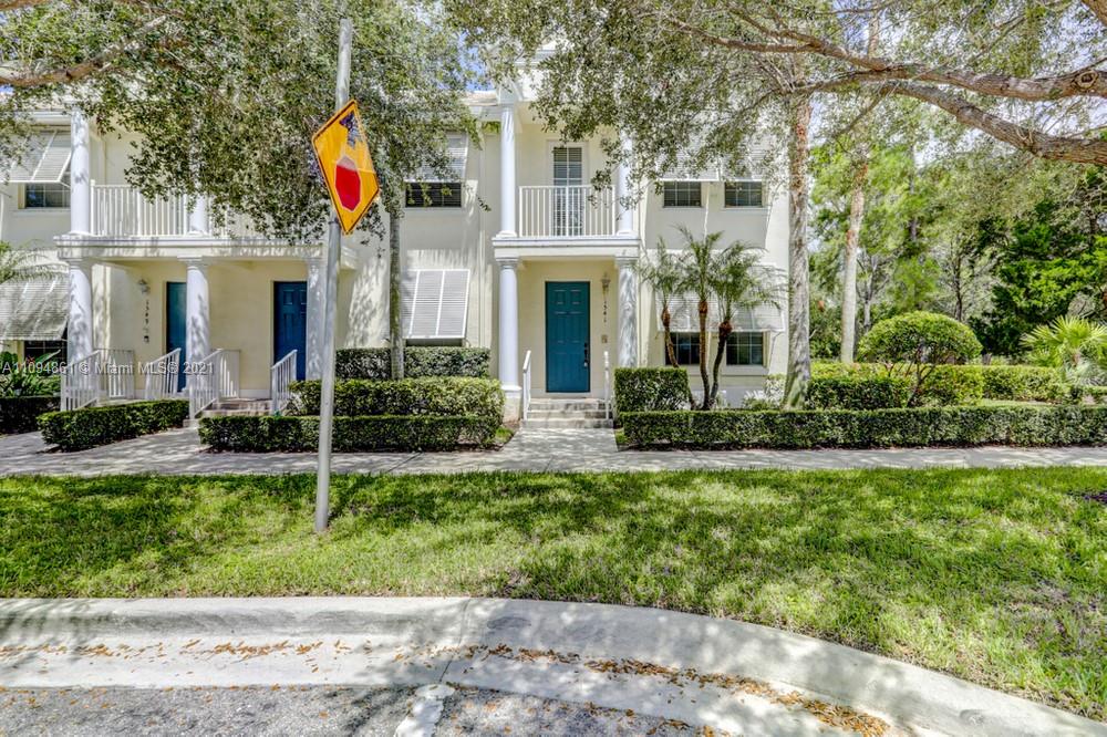 1541 Frederick Small Road, Unit 1541 Jupiter, FL 33458 - Photo 1 of 56 front view of a house with a yard