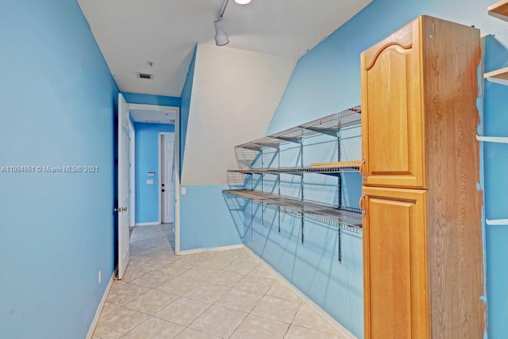 1541 Frederick Small Road, Unit 1541 Jupiter, FL 33458 - Photo 12 of 56 a view of entryway with wooden walls