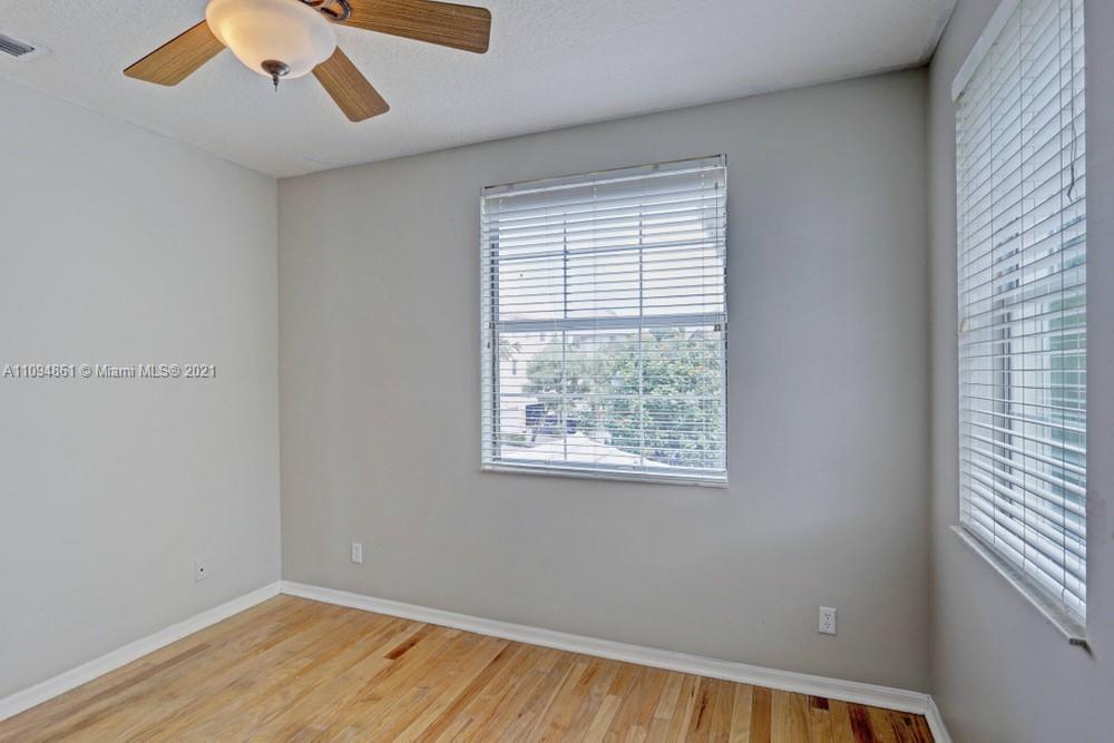 1541 Frederick Small Road, Unit 1541 Jupiter, FL 33458 - Photo 30 of 56 an empty room with a window