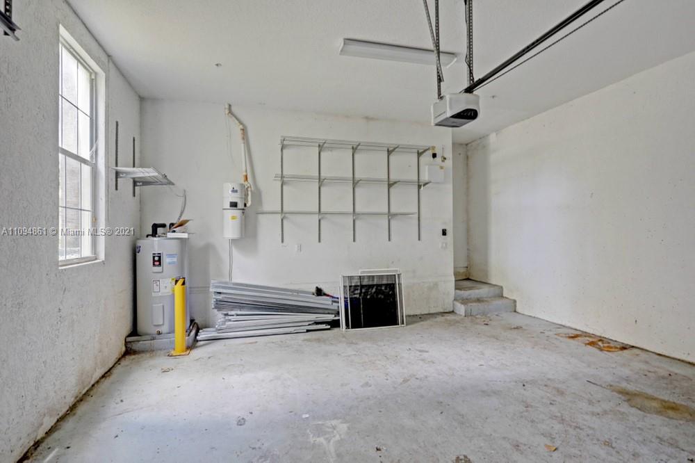 1541 Frederick Small Road, Unit 1541 Jupiter, FL 33458 - Photo 47 of 56 a view of an empty room with a window