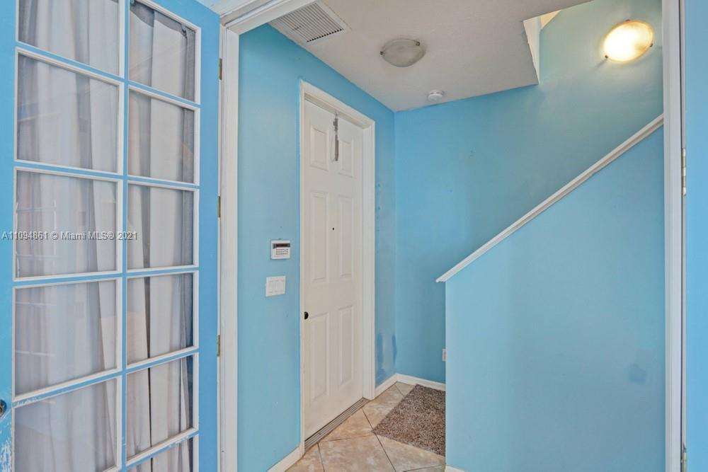 1541 Frederick Small Road, Unit 1541 Jupiter, FL 33458 - Photo 6 of 56 a view of a hallway