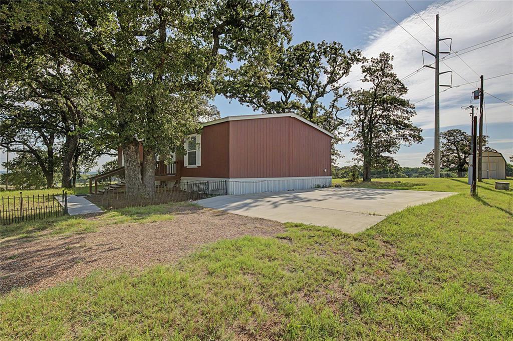 177 New Highland Road Springtown, TX 76082 - Photo 4 of 40 35X22 Concrete parking pad