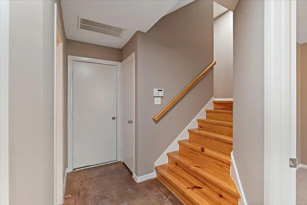 a view of entryway with wooden floor